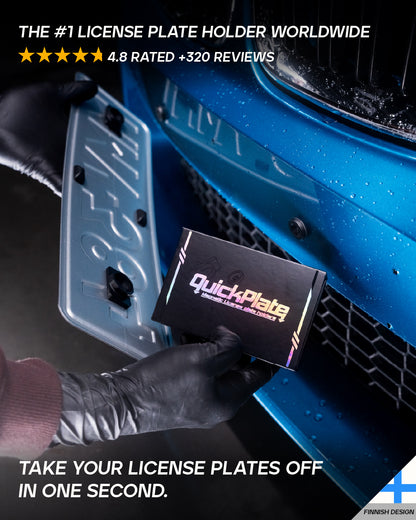 QuickPlate magnetic license plate holder kit held next to a blue BMW front bumper